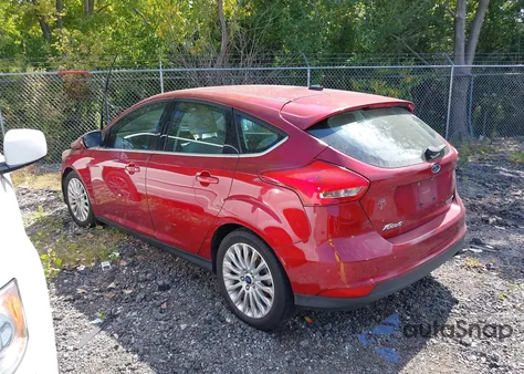 2015 Ford Focus Titanium from USA, damaged, VIN 1FADP3N27FL292462